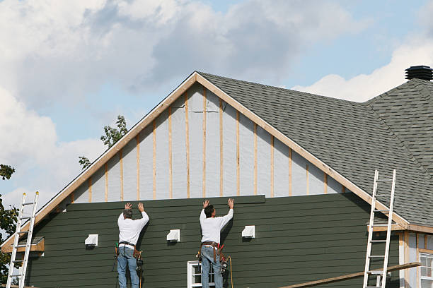 Professional Siding Contractor technician working in Hutto, TX